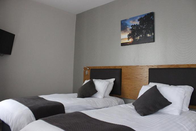 Imagen de la habitación del Hotel Ye Olde Griffin. Foto 8
