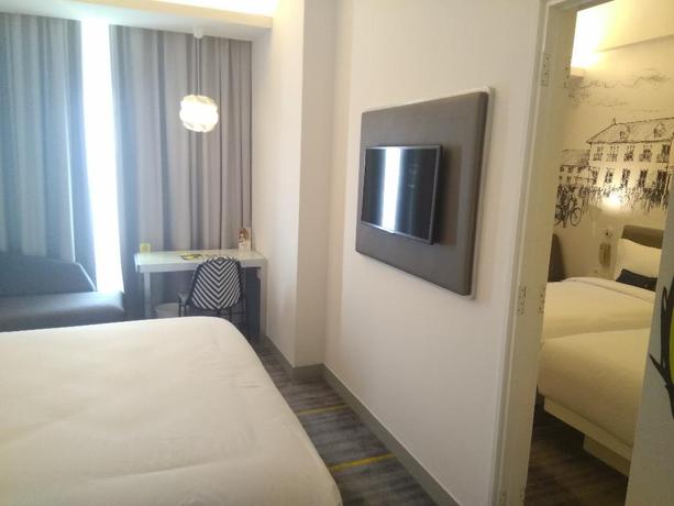 Imagen de la habitación del Hotel Yello Harmoni. Foto 12