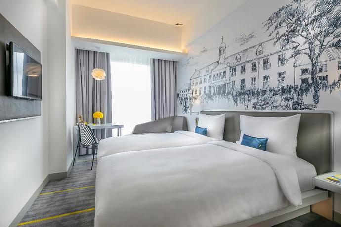 Imagen de la habitación del Hotel Yello Harmoni. Foto 18