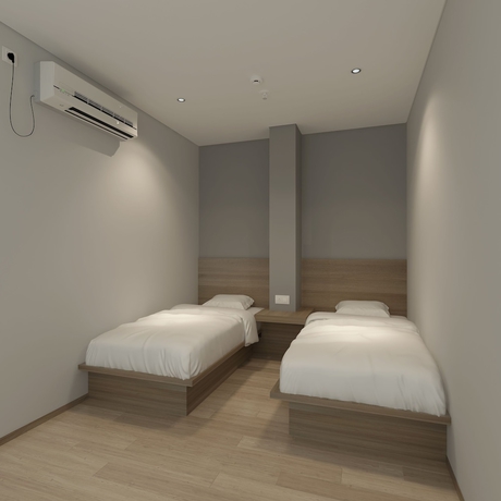 Imagen de la habitación del Hotel Yellow Bee Tanah Abang. Foto 3