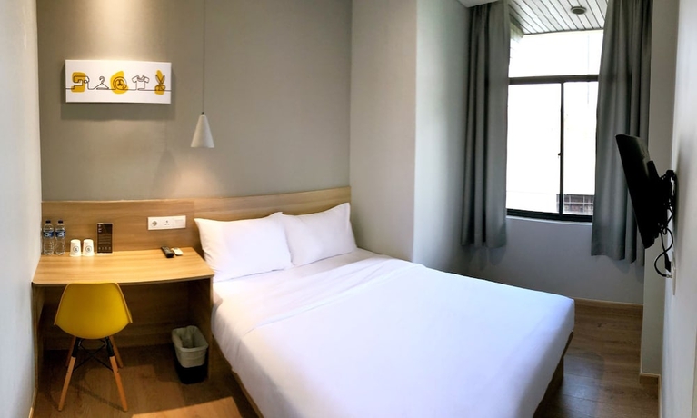 Imagen de la habitación del Hotel Yellow Bee Tanah Abang. Foto 4