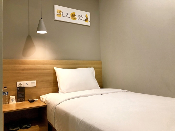 Imagen de la habitación del Hotel Yellow Bee Tanah Abang. Foto 6