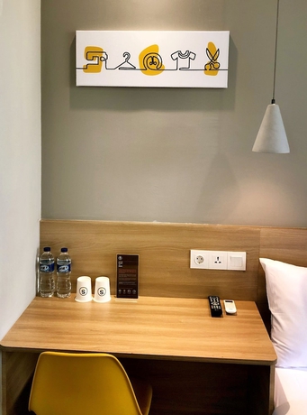 Imagen de la habitación del Hotel Yellow Bee Tanah Abang. Foto 12