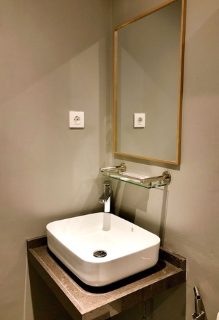 Imagen de la habitación del Hotel Yellow Bee Tanah Abang. Foto 14