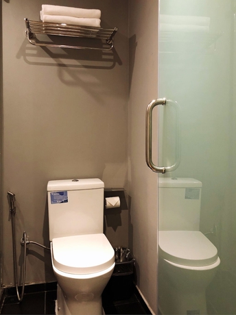 Imagen de la habitación del Hotel Yellow Bee Tanah Abang. Foto 16