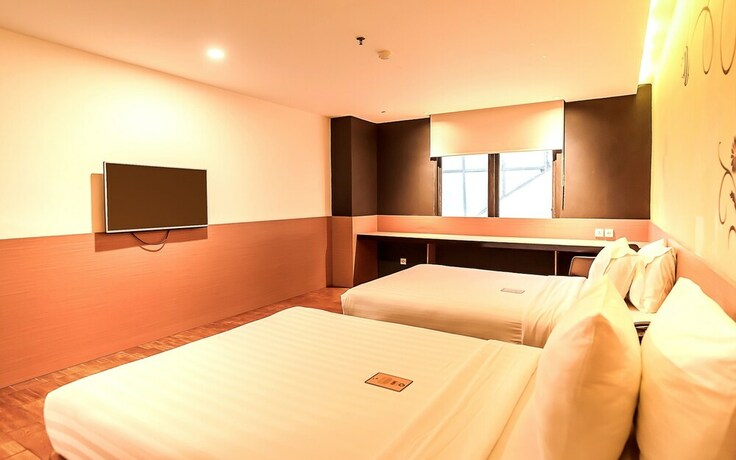 Imagen de la habitación del Hotel Yellow Bee Tangerang. Foto 16