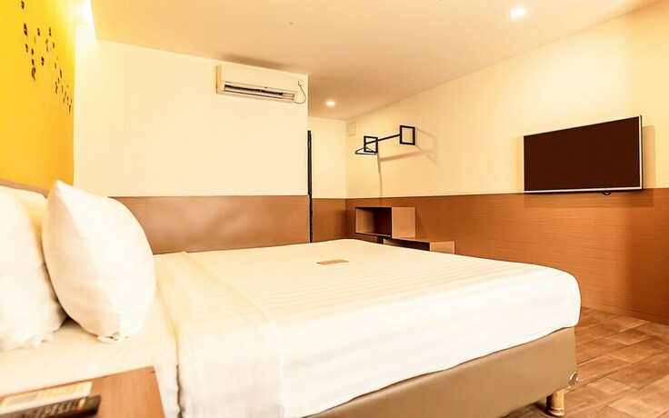 Imagen de la habitación del Hotel Yellow Bee Tangerang. Foto 20