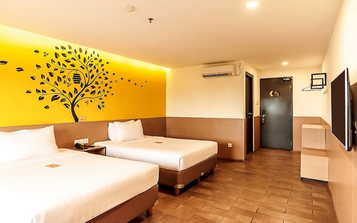 Imagen de la habitación del Hotel Yellow Bee Tangerang. Foto 22