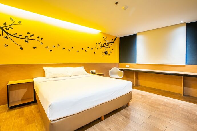Imagen de la habitación del Hotel Yellow Bee Tangerang. Foto 23