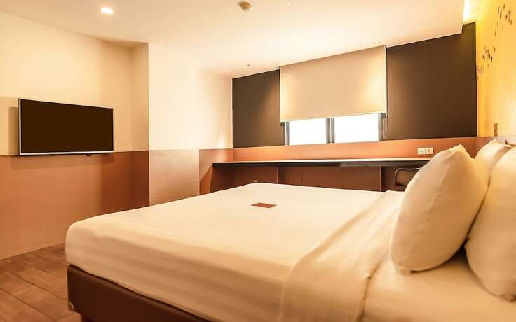 Imagen de la habitación del Hotel Yellow Bee Tangerang. Foto 26