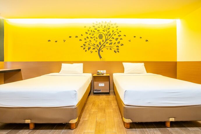 Imagen de la habitación del Hotel Yellow Bee Tangerang. Foto 28