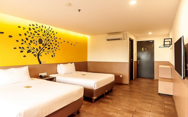 Imagen de la habitación del Hotel Yellow Bee Tangerang. Foto 33