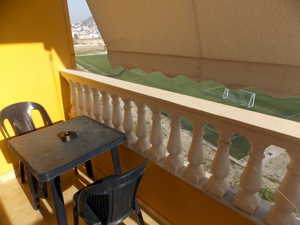 Imagen de la habitación del Hotel Yellow City Apartments. Foto 12