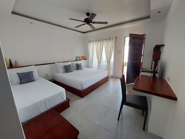 Imagen de la habitación del Hotel Yellow Mango Resort Bohol. Foto 8