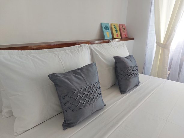 Imagen de la habitación del Hotel Yellow Mango Resort Bohol. Foto 11