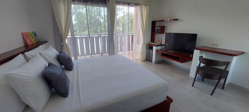 Imagen de la habitación del Hotel Yellow Mango Resort Bohol. Foto 20