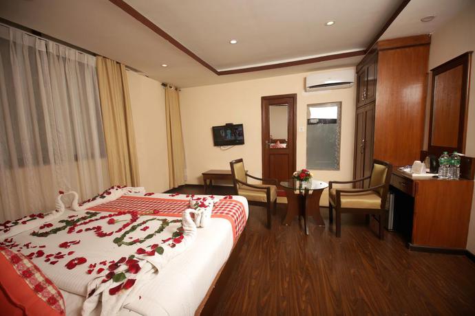 Imagen de la habitación del Hotel Yellow Pagoda. Foto 13