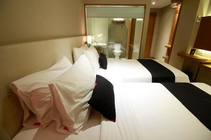Imagen de la habitación del Hotel Yellow Star Ambarukmo. Foto 2