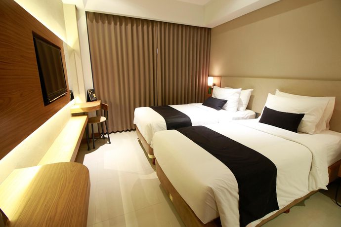 Imagen de la habitación del Hotel Yellow Star Ambarukmo. Foto 9