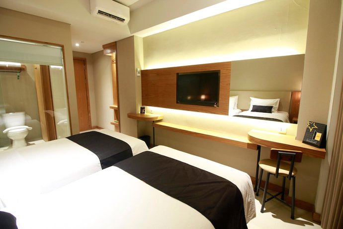 Imagen de la habitación del Hotel Yellow Star Ambarukmo. Foto 11