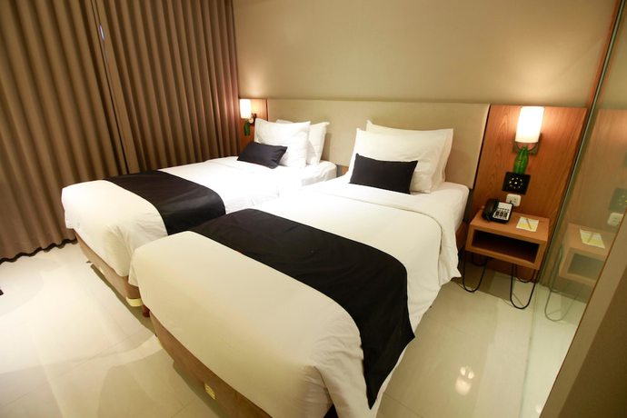 Imagen de la habitación del Hotel Yellow Star Ambarukmo. Foto 14