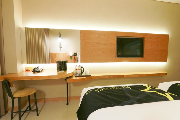 Imagen de la habitación del Hotel Yellow Star Gejayan. Foto 4