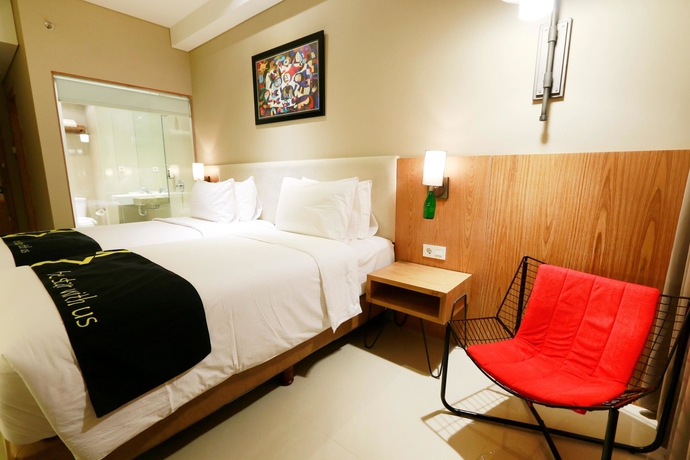 Imagen de la habitación del Hotel Yellow Star Gejayan. Foto 6
