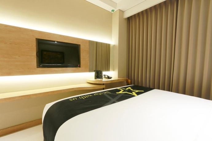 Imagen de la habitación del Hotel Yellow Star Gejayan. Foto 7