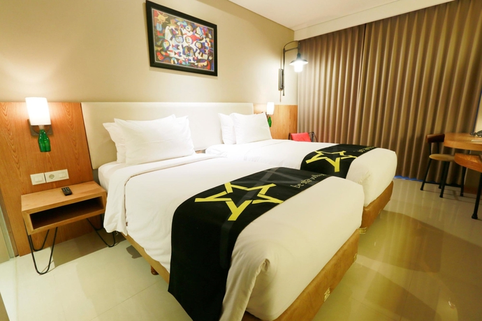 Imagen de la habitación del Hotel Yellow Star Gejayan. Foto 11