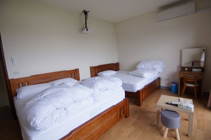 Imagen de la habitación del Hotel Yellow Wind Bell BandB. Foto 4