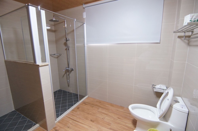 Imagen de la habitación del Hotel Yellow Wind Bell BandB. Foto 10