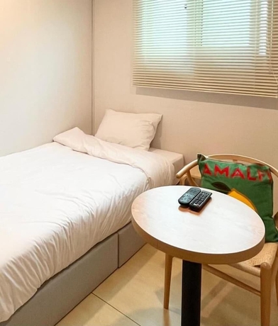 Imagen de la habitación del Hotel Yellow stay. Foto 11