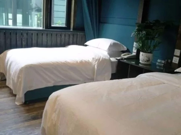 Imagen de la habitación del Hotel Yema Silk Road Inn. Foto 12