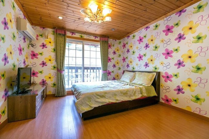 Imagen de la habitación del Hotel Yeomiji Pension. Foto 9