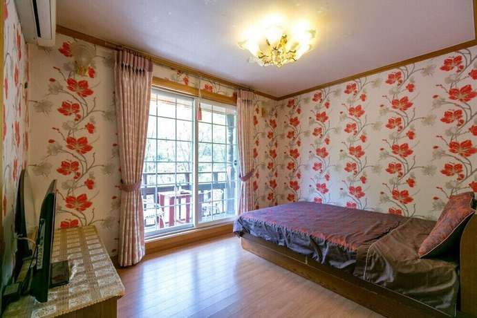 Imagen de la habitación del Hotel Yeomiji Pension. Foto 11