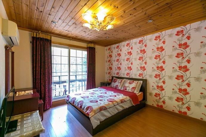 Imagen de la habitación del Hotel Yeomiji Pension. Foto 18