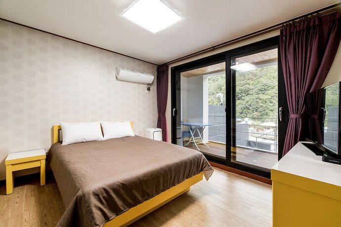 Imagen de la habitación del Hotel Yeoninsan Hot Spring Resort. Foto 23