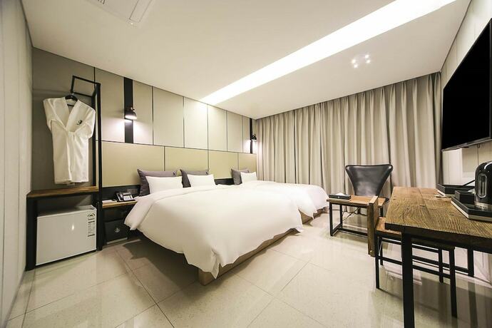 Imagen de la habitación del Hotel Yeoubi. Foto 18