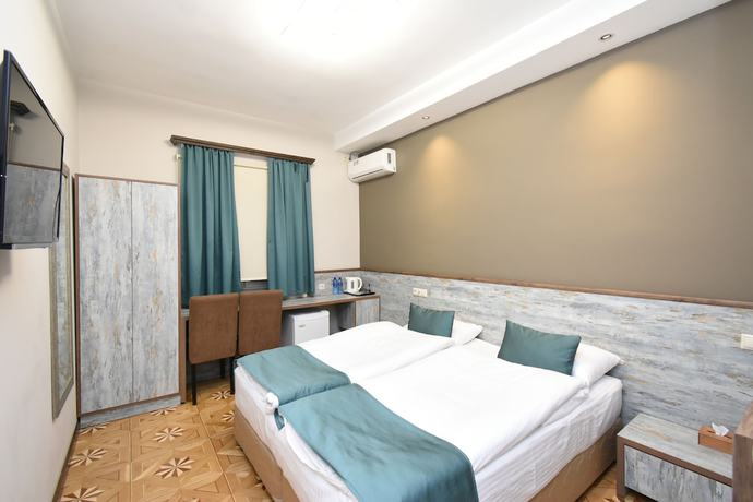 Imagen de la habitación del Hotel Yerevan Boutique. Foto 12