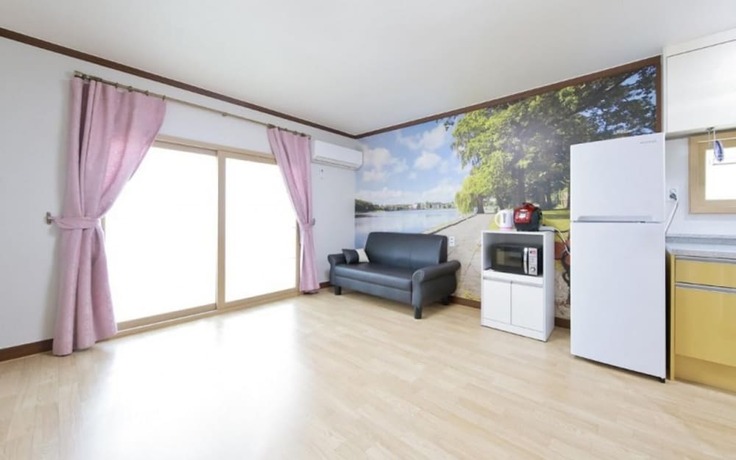 Imagen de la habitación del Hotel Yesan Sanmaru Pension. Foto 16
