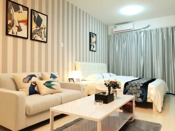 Imagen de la habitación del Hotel Yi Chao Apartment. Foto 15