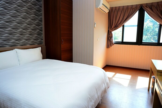 Imagen de la habitación del Hotel Yi Da Lakeside. Foto 3