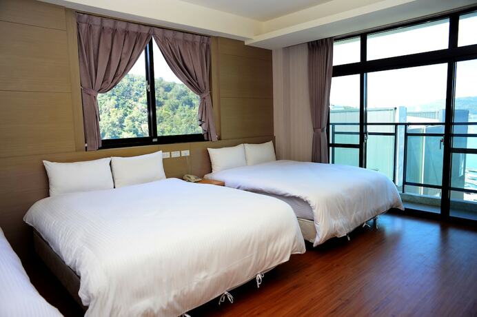 Imagen de la habitación del Hotel Yi Da Lakeside. Foto 8