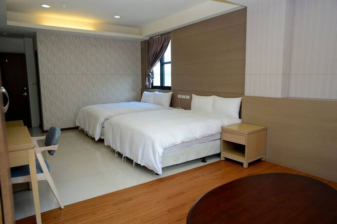 Imagen de la habitación del Hotel Yi Da Lakeside. Foto 9