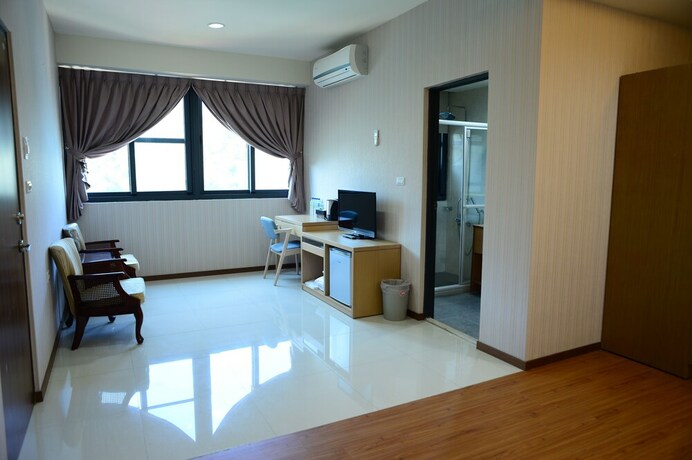 Imagen de la habitación del Hotel Yi Da Lakeside. Foto 11