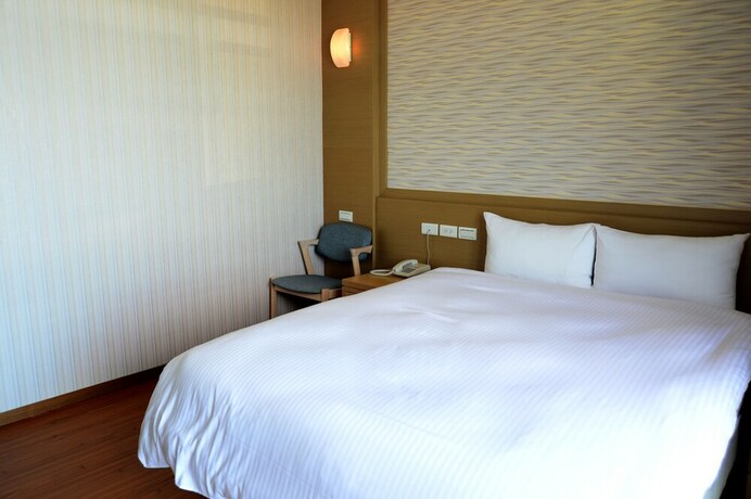 Imagen de la habitación del Hotel Yi Da Lakeside. Foto 12