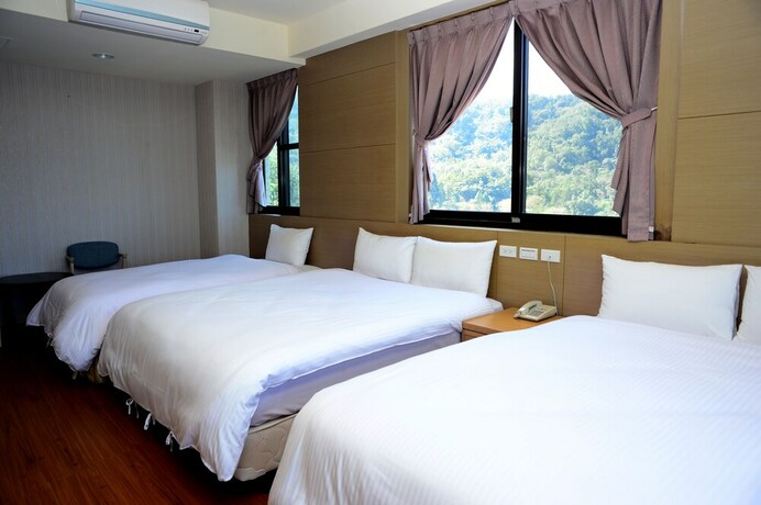 Imagen de la habitación del Hotel Yi Da Lakeside. Foto 15