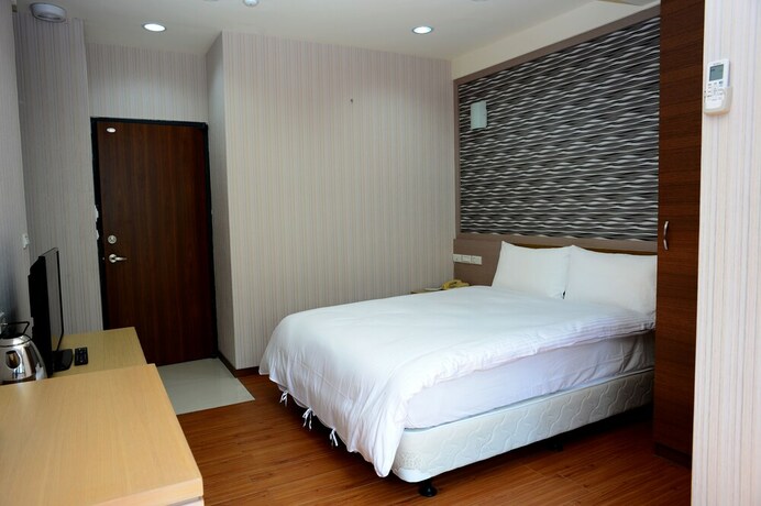 Imagen de la habitación del Hotel Yi Da Lakeside. Foto 16