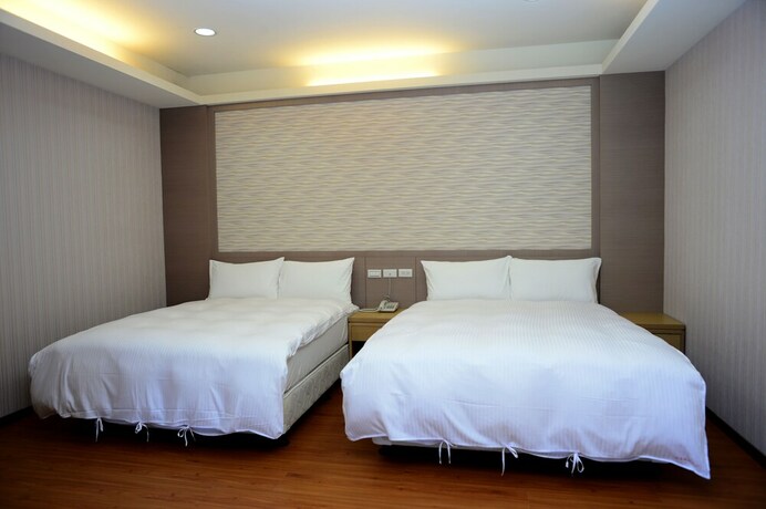 Imagen de la habitación del Hotel Yi Da Lakeside. Foto 17