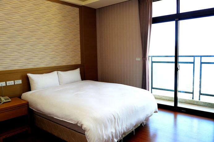 Imagen de la habitación del Hotel Yi Da Lakeside. Foto 18